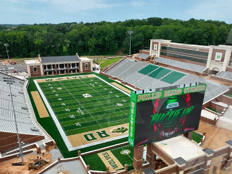 Aerial view of Phillip Beard Stadium football field with large video scoreboard