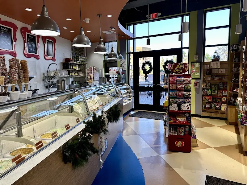 Ice cream shop interior with gelato display case and Jelly Belly candy rack